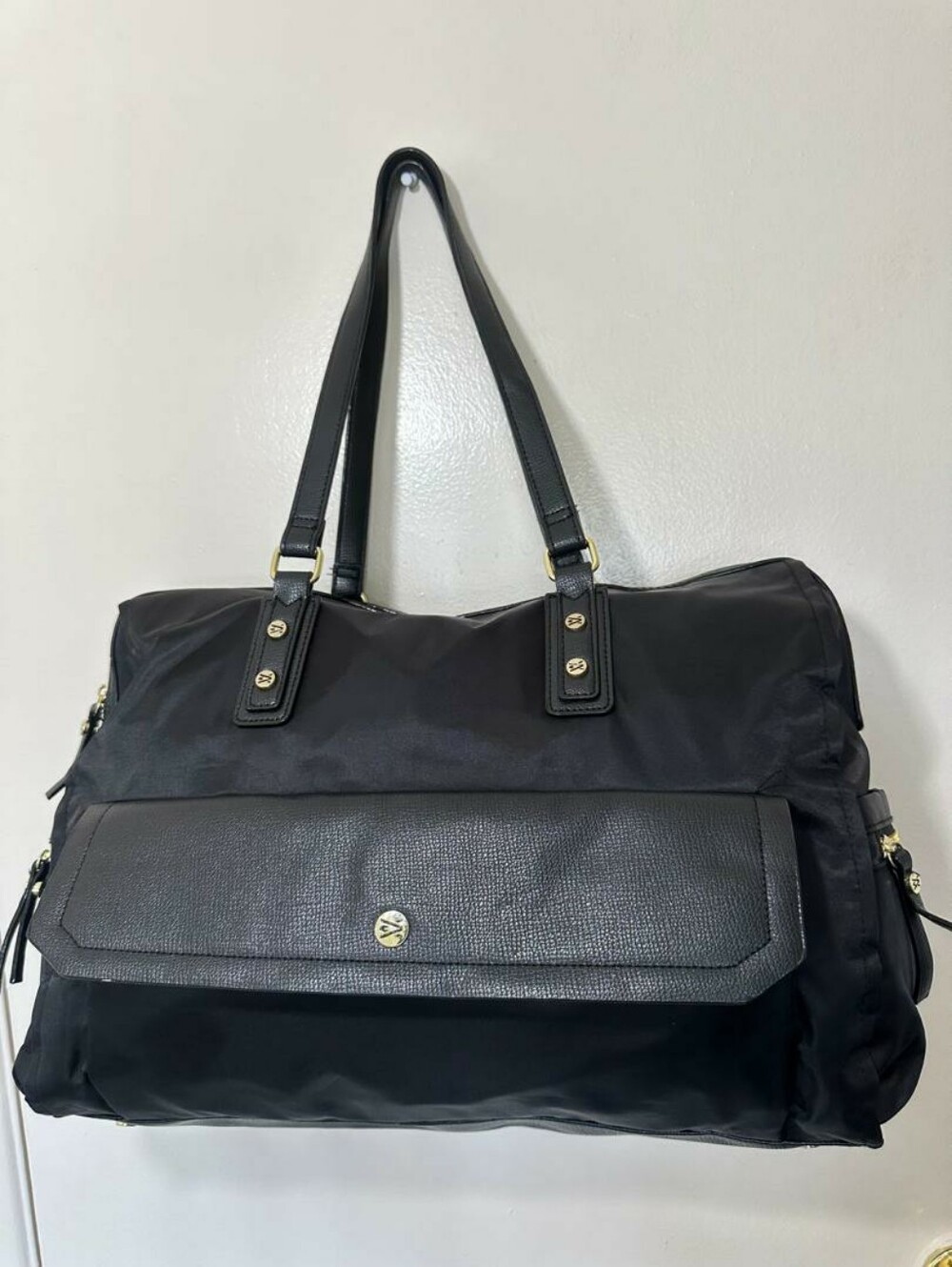 Travanti Work Tote Black Nylon with a Textured Front Pocket and Gold Hardware